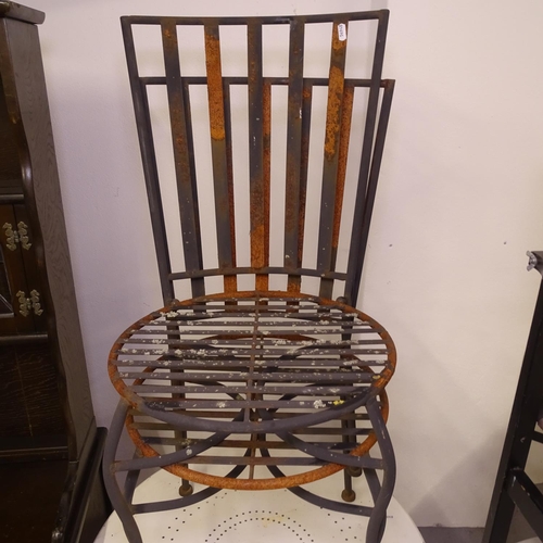 1983 - A white metal circular garden table, and a pair of garden chairs