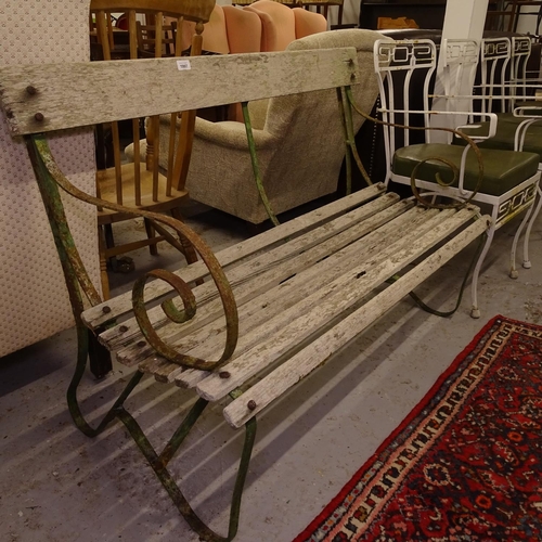 1997 - A wrought-iron scrolled and hardwood slatted garden bench, L118cm