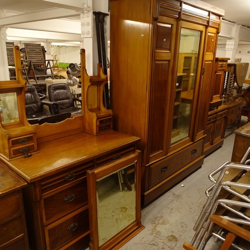 2010 - An Edwardian satin-walnut bedroom suite, comprising mirrored wardrobe, washstand, dressing table, be... 