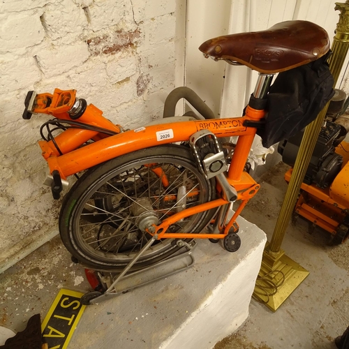 2026 - A Brompton folding bicycle, with a Brooks leather saddle