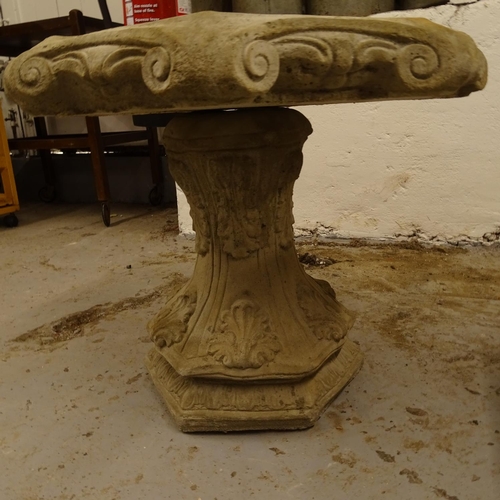 2035 - A concrete 2-section birdbath, on acanthus leaf pedestal, W50cm, H40cm