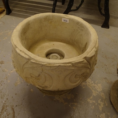 2039 - A pair of concrete 2-section garden pots on pedestal stands, with embossed acanthus leaf decoration,... 