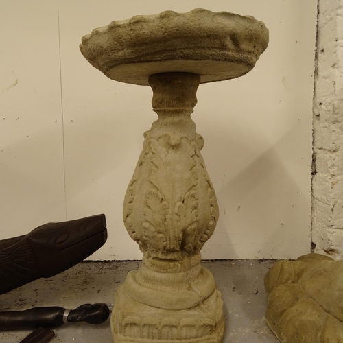 2047 - A concrete 2-section garden birdbath, on acanthus leaf embossed pedestal, W36cm, H60cm