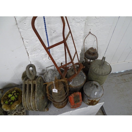 2074 - A collection of galvanised metal smoker's, tilly lamps, pulley etc (9)