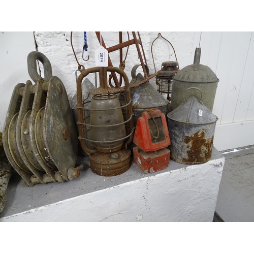 2074 - A collection of galvanised metal smoker's, tilly lamps, pulley etc (9)