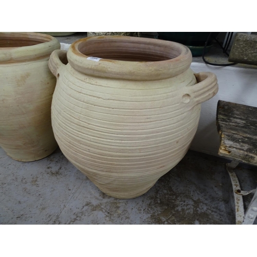 2084 - A large terracotta 2-handled ribbed garden pot, W58cm, H63cm