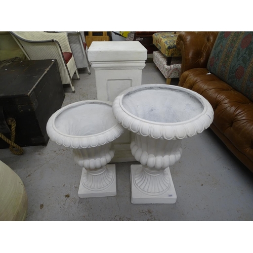 2085 - A graduated pair of fibreglass campana urns, and a composite pedestal column, column height 77cm