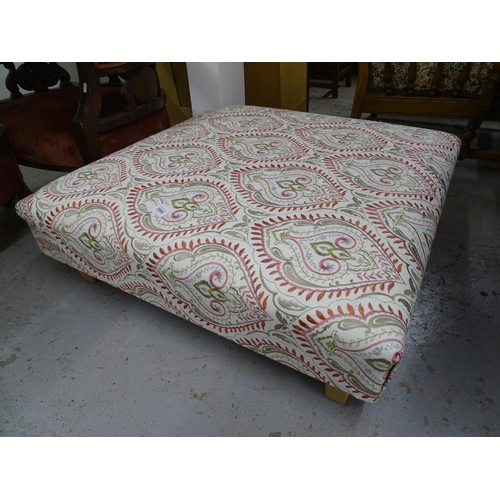 2088 - A large square footstool with cream patterned upholstery on tapered beech legs, W92cm, H28cm