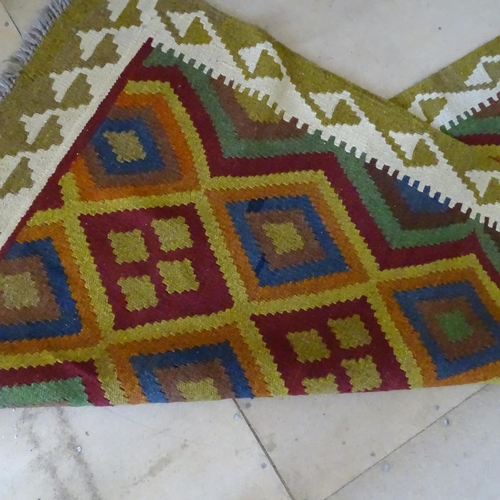 2090 - A Mamainer red ground runner, 298cm x 82cm