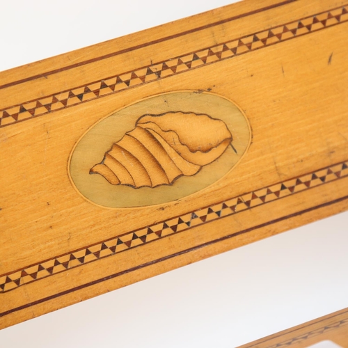 504 - An Edwardian satinwood and marquetry inlaid book rack, length 40cm