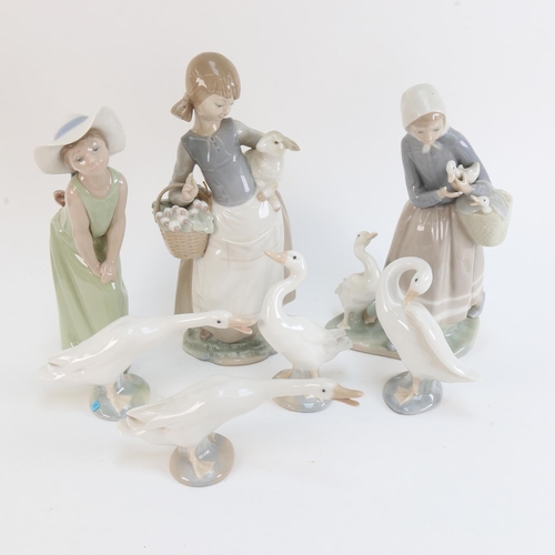 525 - A group of Lladro porcelain children and geese, height 24cm (7)