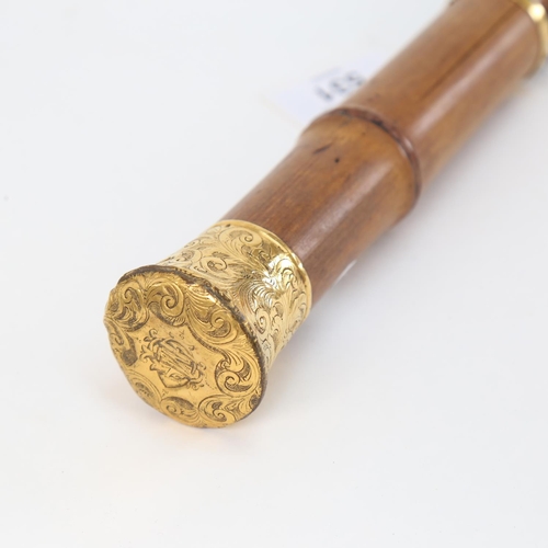 531 - A 19th century parasol/umbrella frame, with bamboo and gilt-metal handle