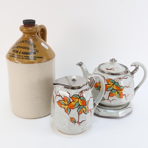 545 - 1930s pottery teapot on stand, and matching hot water jug, and a Stanton's stoneware flagon