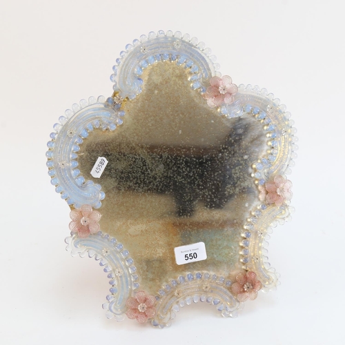 550 - An Italian moulded glass framed dressing table mirror, height 35cm, missing 1 floral mount