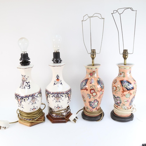 554 - 2 pairs of Oriental porcelain table lamps, on wooden stands, height 63cm overall