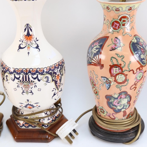 554 - 2 pairs of Oriental porcelain table lamps, on wooden stands, height 63cm overall