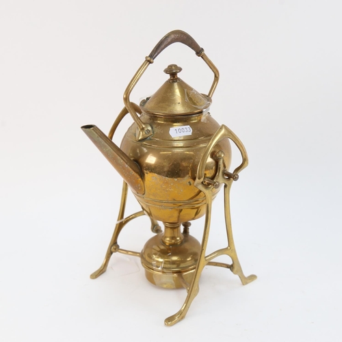 562 - An Arts and Crafts brass spirit kettle on stand, height 31cm