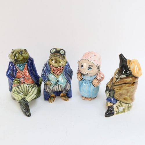 570 - A set of 4 David Sharp Rye Pottery painted Wind in the Willows figures, tallest 19cm