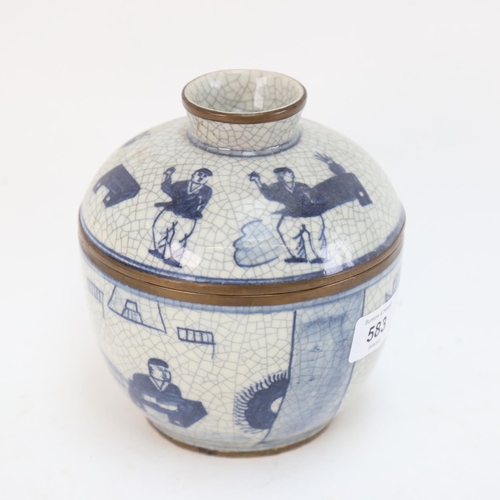 583 - A Chinese blue and white crackle glaze jar and cover, with brass mounts, height 15cm