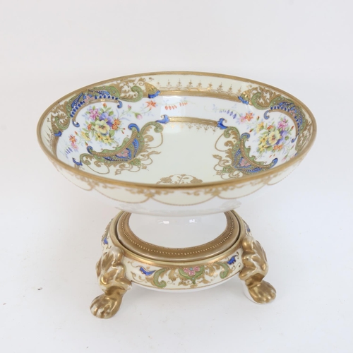 589 - A Japanese pedestal comport, with painted and gilded decoration, 25cm across, and matching pot