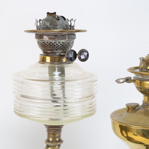 596 - A Victorian brass twist oil lamp on plinth, with moulded glass font, height 48cm, and 2 other brass ... 