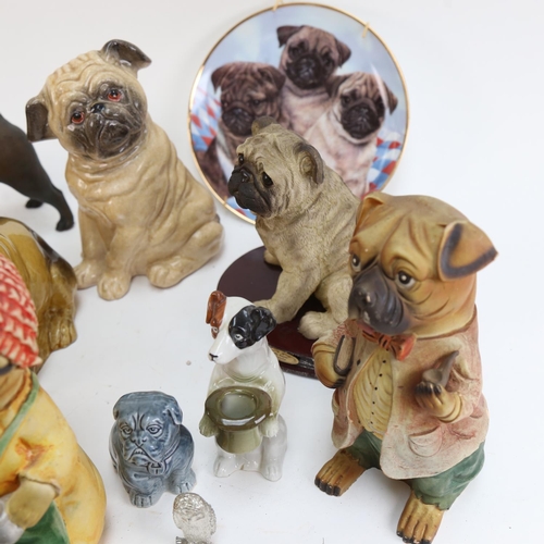 603 - A collection of ceramic and other dog figures, including Pugs and a Jack Russell etc