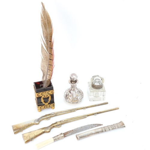 611 - WITHDRAWN:A silver overlay scent flask, 8.5cm, a pair of miniature rifles, a cut-glass inkwell, an E... 