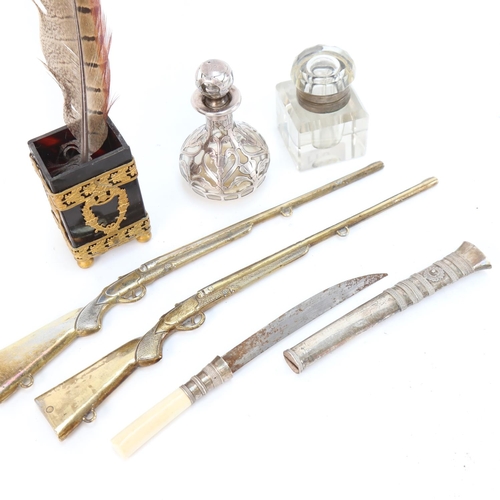 611 - WITHDRAWN:A silver overlay scent flask, 8.5cm, a pair of miniature rifles, a cut-glass inkwell, an E... 