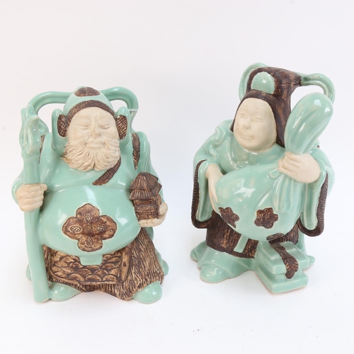 624 - A pair of Chinese celadon glaze pottery figures, largest height 28cm