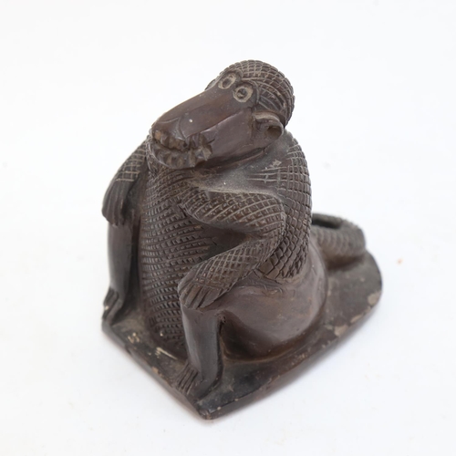 627 - A Turkish figural bath scraper, height 12.5cm