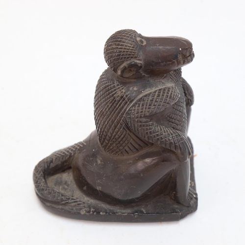 627 - A Turkish figural bath scraper, height 12.5cm