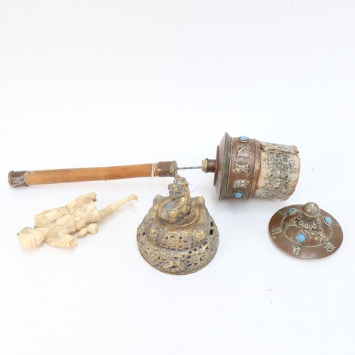 629 - A turquoise inlaid copper prayer wheel, a bell (lacking clapper), and an ivory figure (A/F), 13.5cm