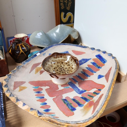 641 - A table centre bowl with painted design, 54cm across, a signed Studio pottery free-form dish, Ewenny... 