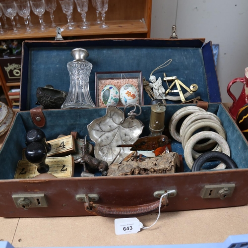 643 - A small case with ornaments, a perfume bottle, a miniature miner's lamp etc