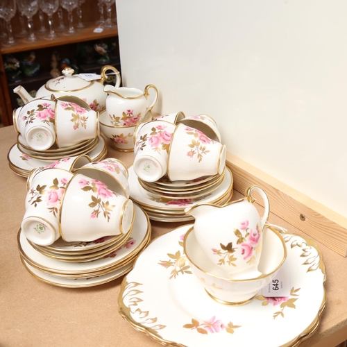 645 - A Salisbury bone china tea service for 12 people, with pink rose decoration