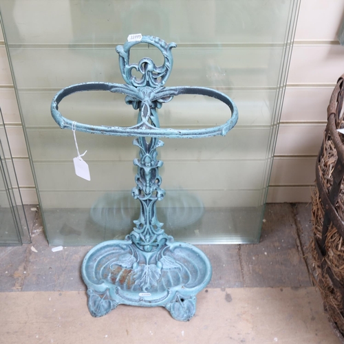 658 - A reproduction cast-iron umbrella stand, height 57cm