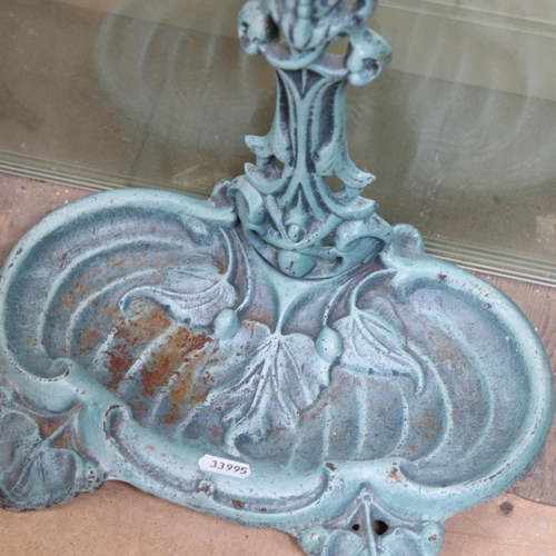 658 - A reproduction cast-iron umbrella stand, height 57cm