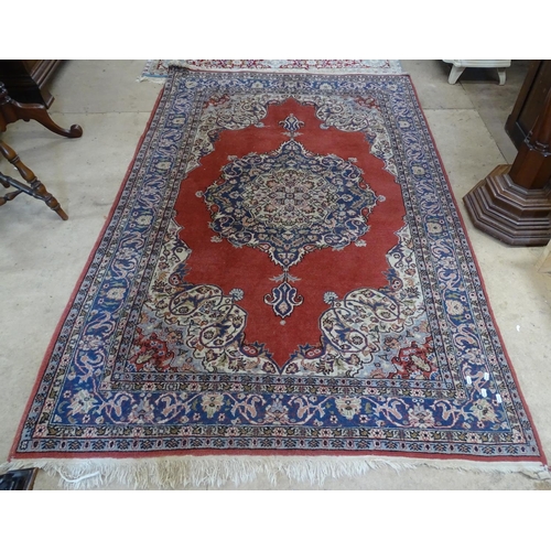 2093 - Red ground Persian style rug 208cm x 139cm