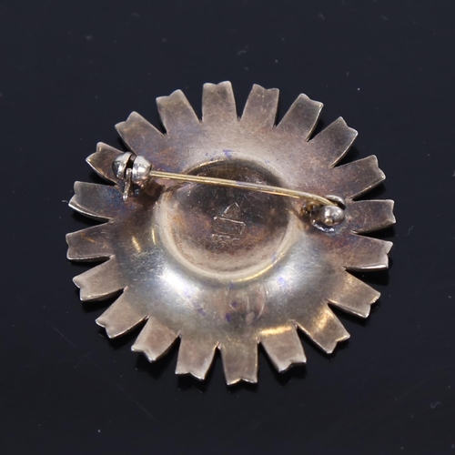 884 - ANTON MICHELSEN - a silver-gilt and white enamel daisy design brooch