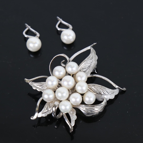 885 - A large Japanese silver and pearl set spray design brooch and a pair of earrings, by Mitsukoshi, mar... 