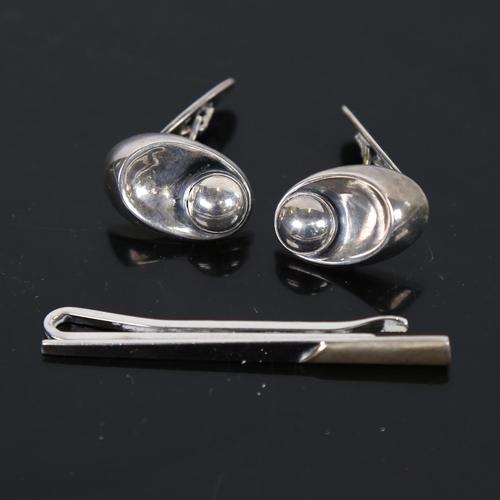 886 - N. E. FROM - stylised sterling silver cufflinks, and a silver-gilt tie clip