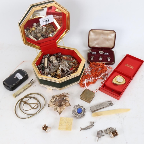 894 - A collection of costume jewellery, to include coral necklaces, cufflink and stud set, brooches etc