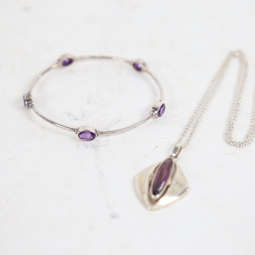 903 - A Danish silver and amethyst set necklace and pendant, and an unmarked silver and amethyst set bangl... 