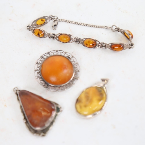 910 - Various Baltic amber silver-mounted pendants, and an amber panel bracelet