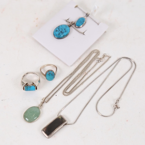 932 - A box containing Danish silver and turquoise pendants and necklaces, rings etc