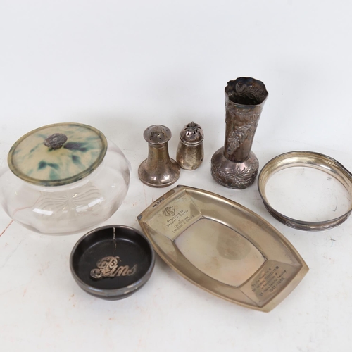 943 - A group of silver items, to include a rectangular presentation dish, a Chinese style vase, pepperett... 