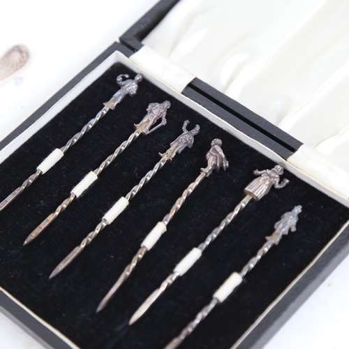 948 - A cased set of 6 silver cocktail sticks with figural ends, a silver jam spoon and knife, and a pair ... 