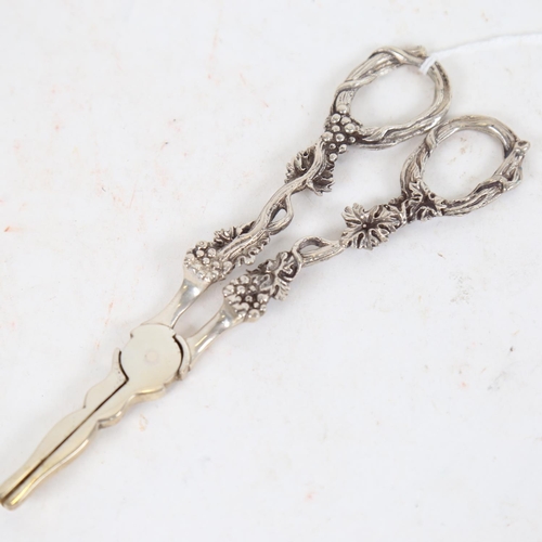 949 - A pair of Continental cast-silver grape scissors, with berry and leaf embossed decoration, marked 80... 