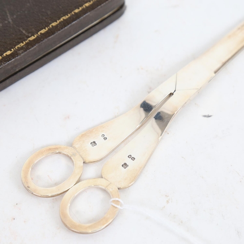 950 - A pair of Victorian silver grape scissors, with allover engraved decoration, maker's marks JA and JS... 