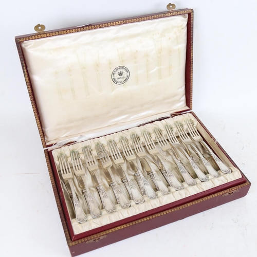 951 - A cased set of a German silver dessert set of cutlery, for 12 people, in original fitted case, marke... 